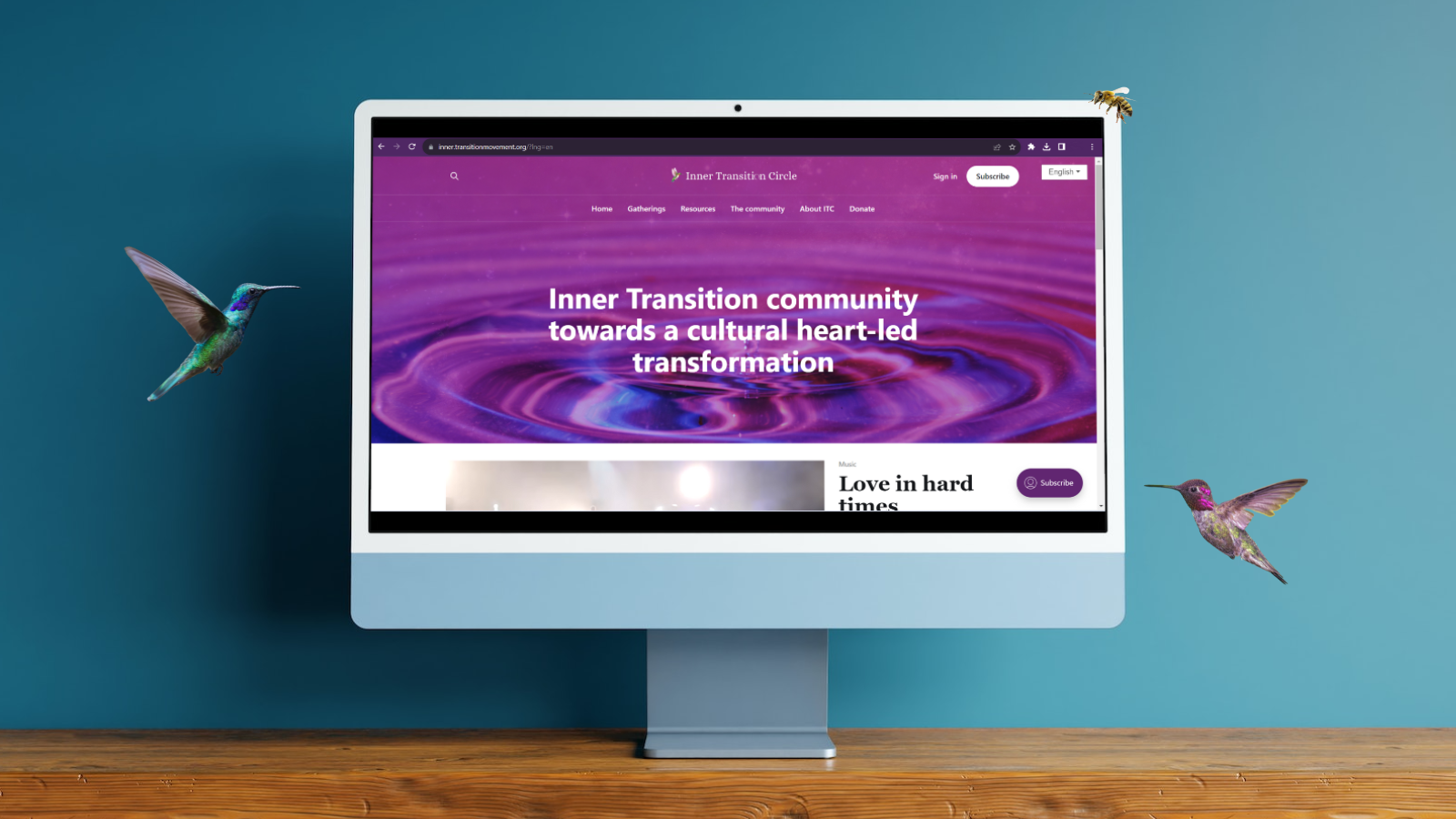 The ITC website homepage surrounded by a couple of curious hummingbirds and a bee